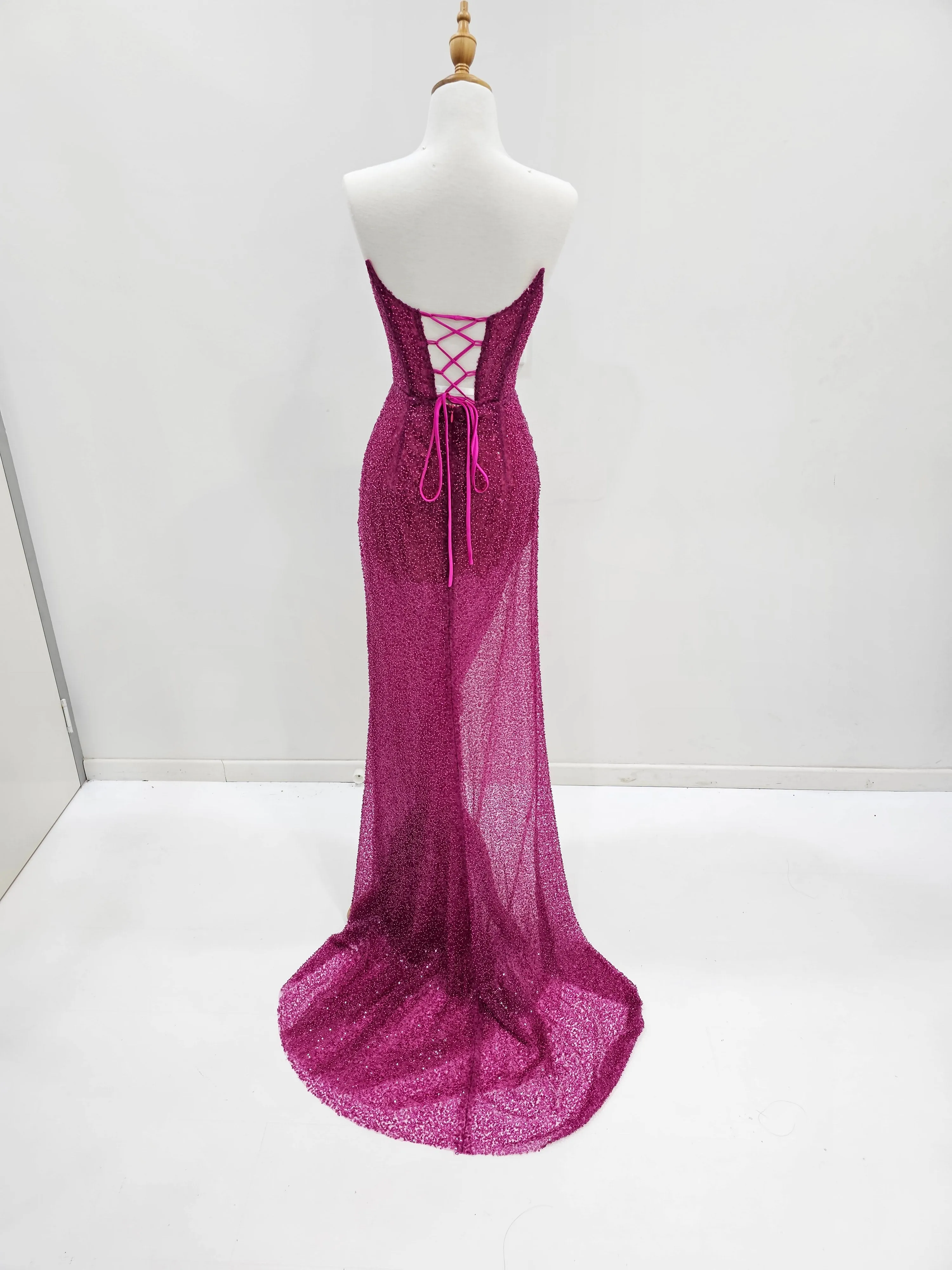 Beaded magenta strapless corset dress