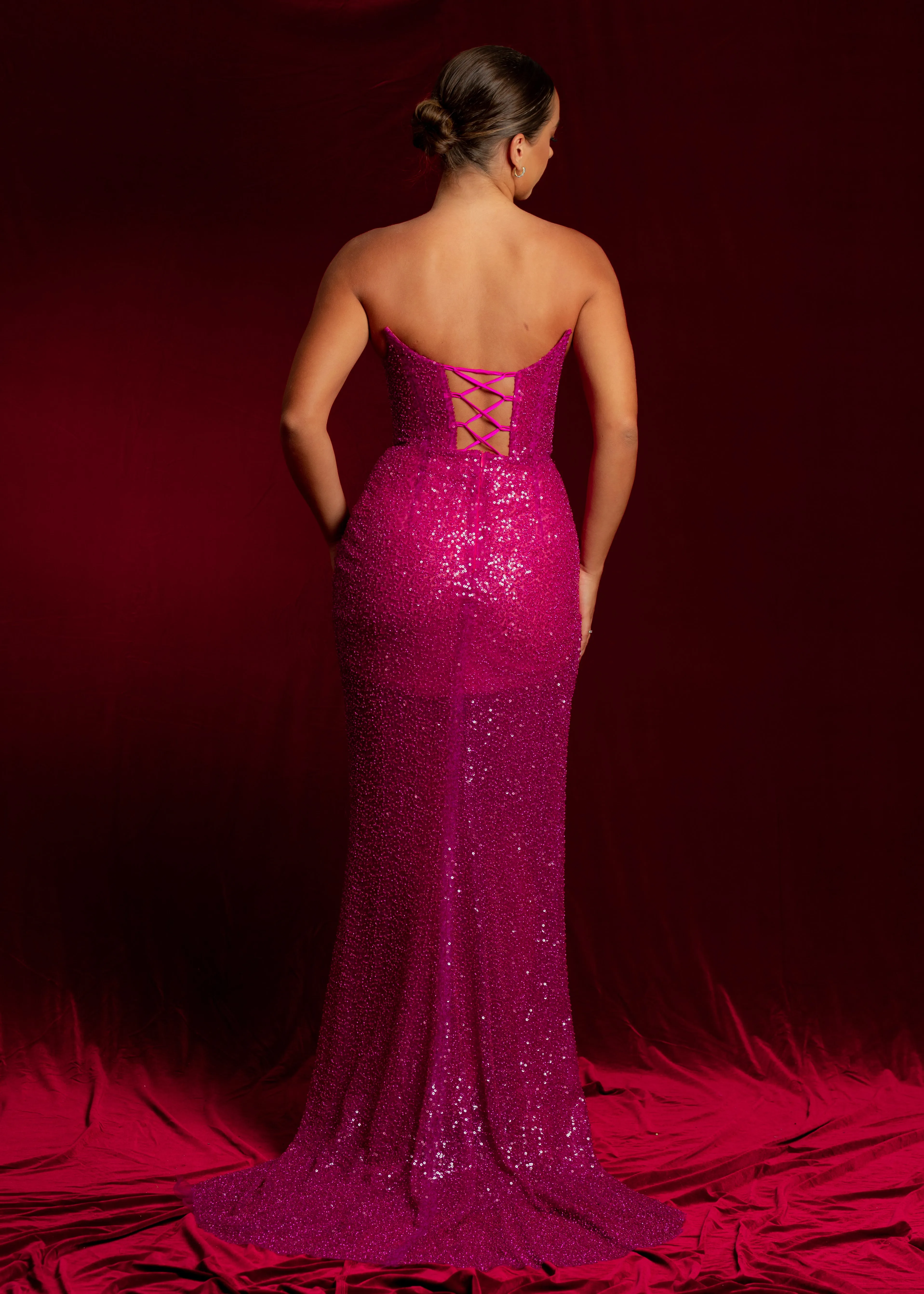 Beaded magenta strapless corset dress